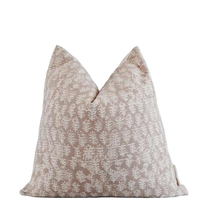 Cushion cover with a repeated botanical print