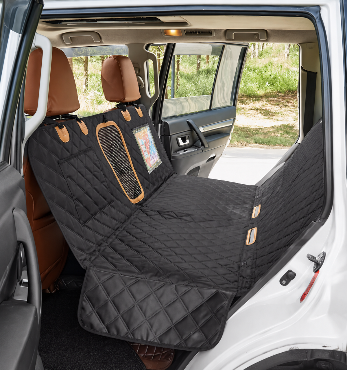 Dog car-seat hammock installed across a vehicle back seat